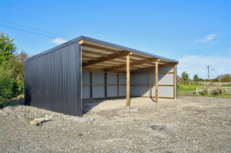 Pole shed with dark steel cladding